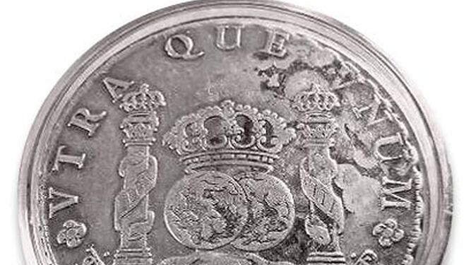 Imagen de una moneda de plata de 1768, el real de la colonia española